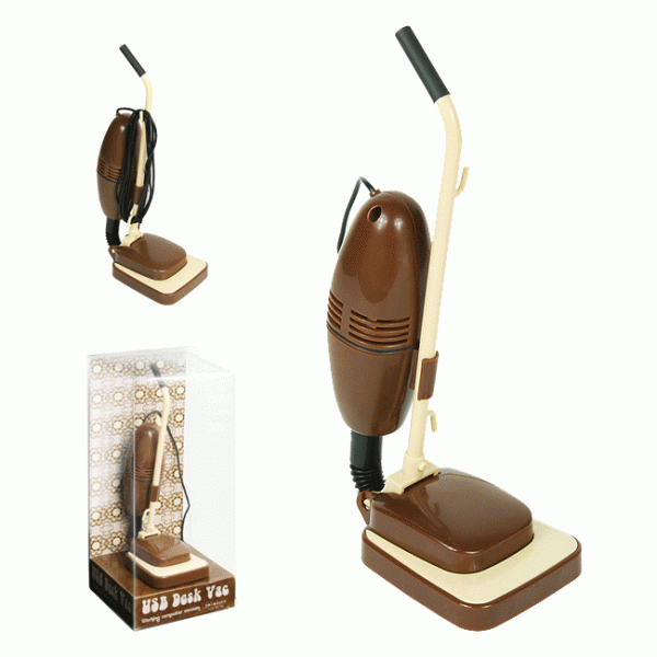 USB desk vacuum shaped like a miniature upright vacuum cleaner, shown beside its retail box